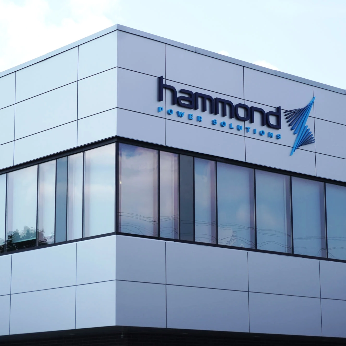 Corporate office exterior with Hammond Power Solutions signage