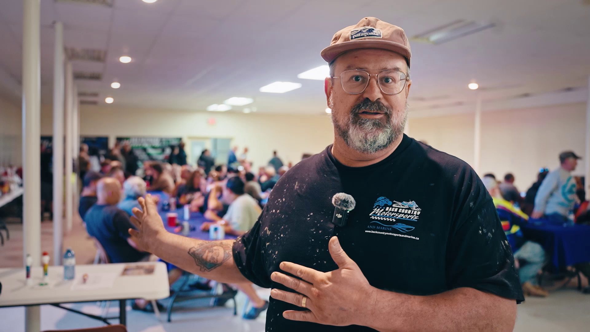 Trail coordinator Dennis addresses the crowd at the Jamboree banquet