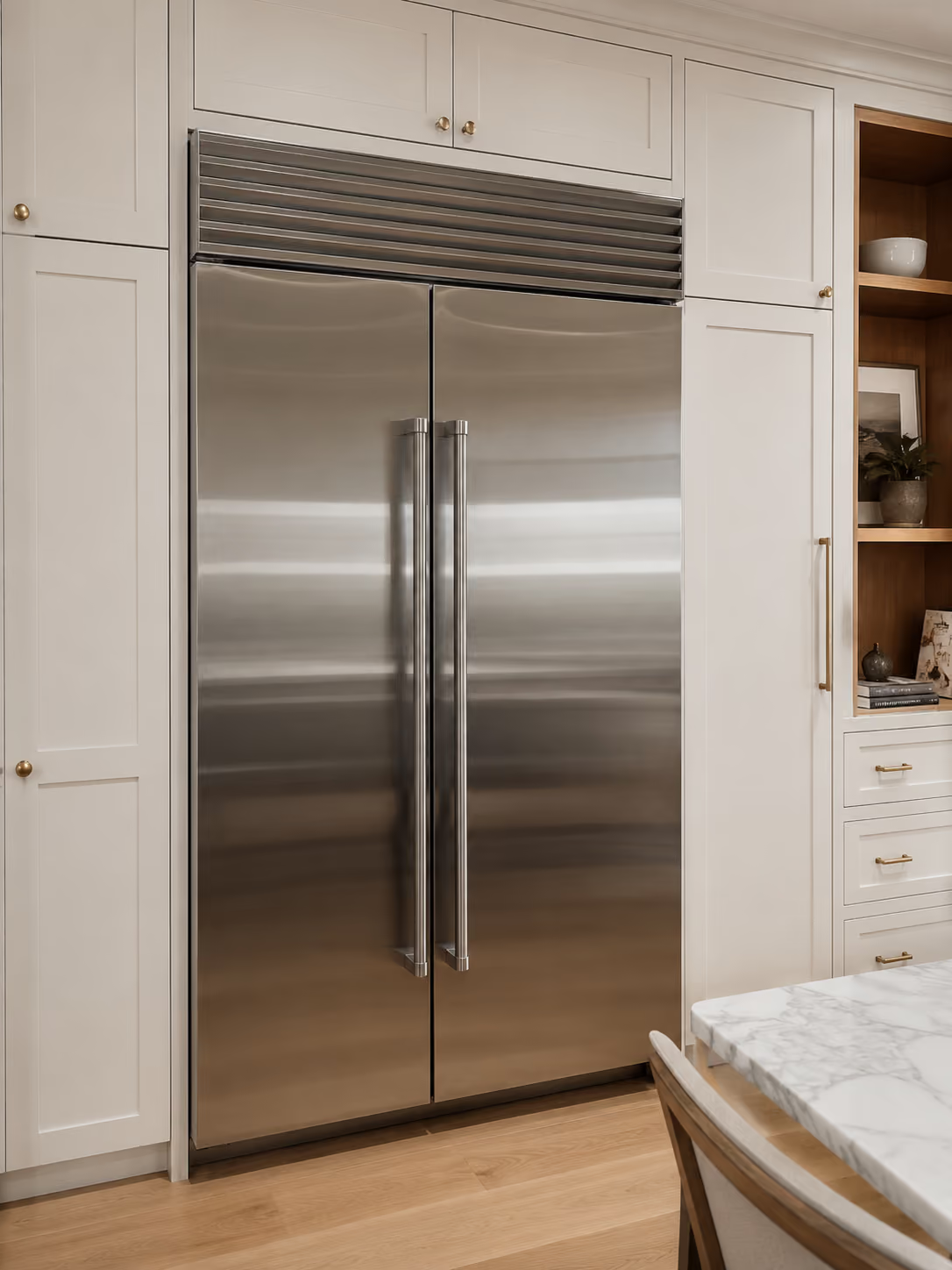 sub-zero refrigerator standing in a residential kitchen