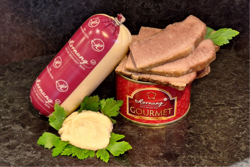 Eine Dose und eine Portionsrolle aus der Hornung Gourmetkücke. 