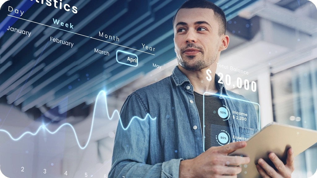 Homme consultant des statistiques financières avec interface numérique et tablette - BSB pour le blog de business developer