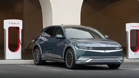 Hyundai electric car utilizing a Tesla charger
