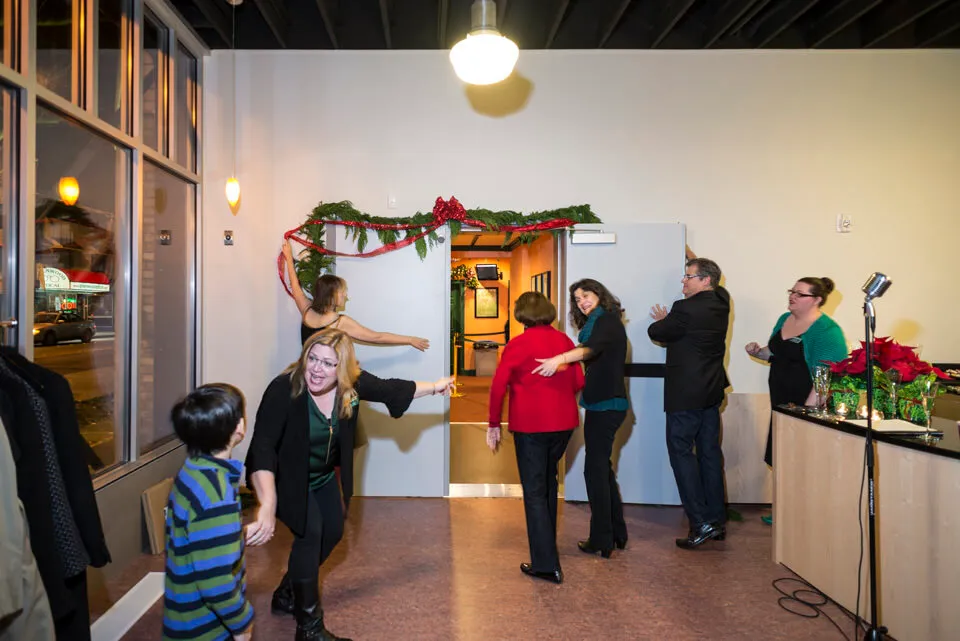 Major donors the Kendalls, who the new building is named after, make the inaugural entry from the new building to the existing theatre.