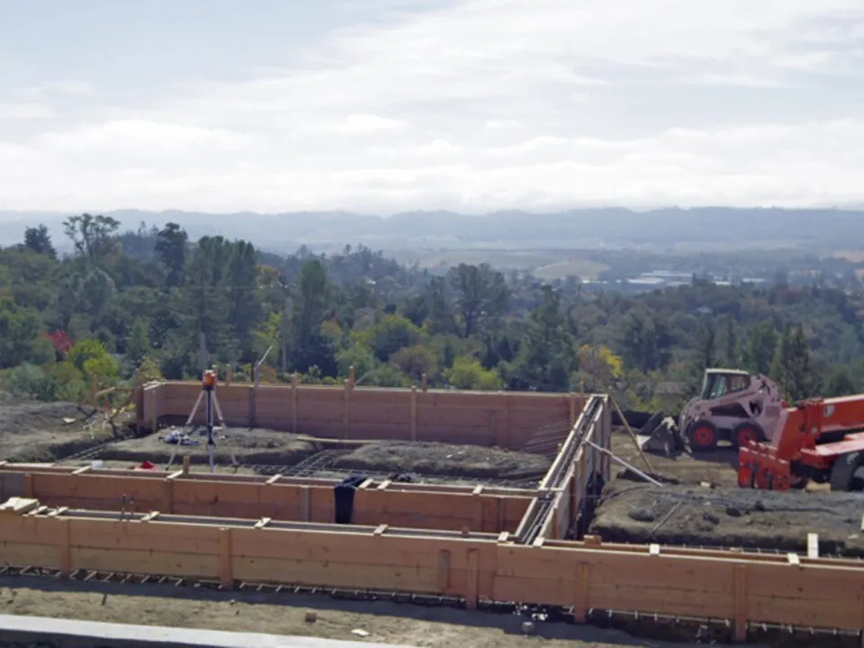 A look at the foundation before the install. The site features amazing vistas and is situated on a very steep hillside.