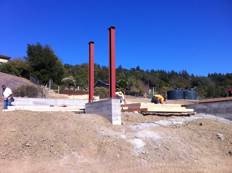 The beginning. Steel support beams for the cantilevered portion of the upper floor.