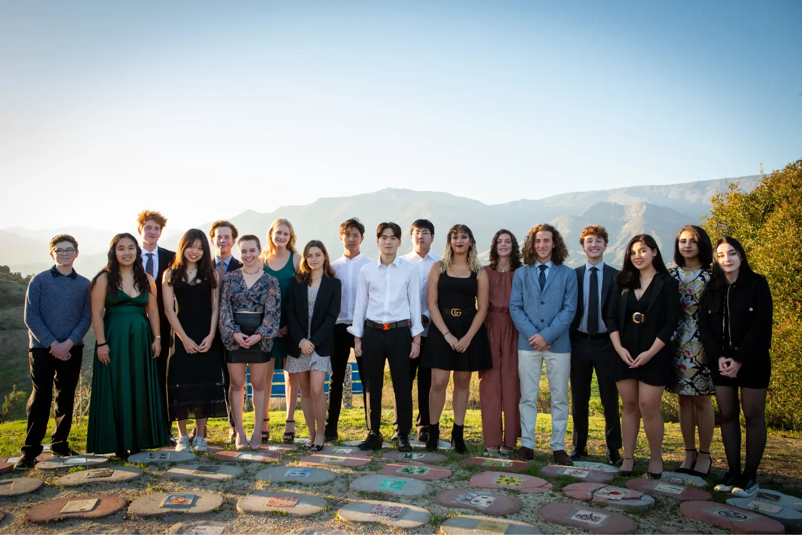 Besant Hill students in formal wear with mountains behind
