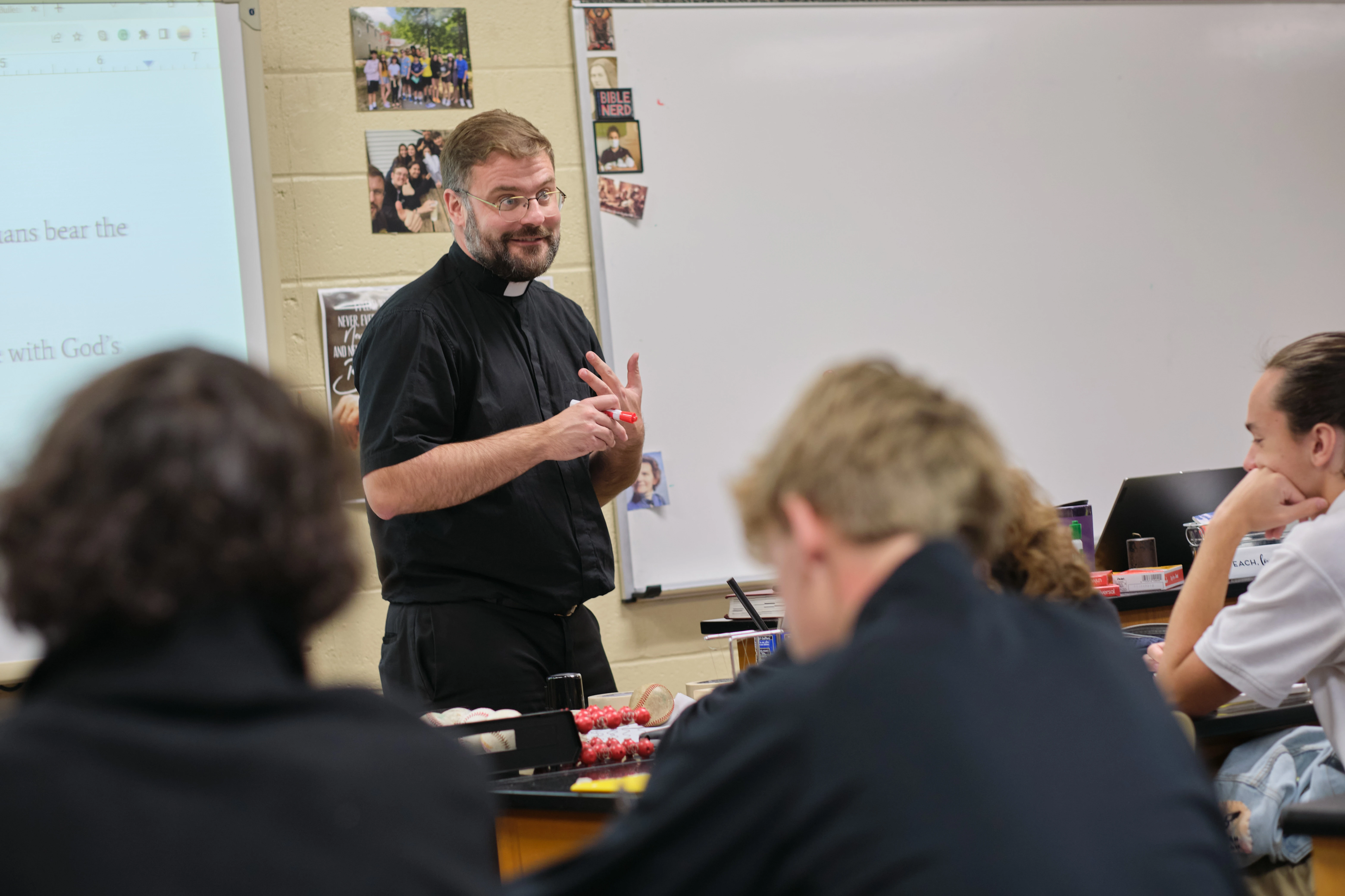 Teacher leading a discussion in a Bishop Fenwick classroom
