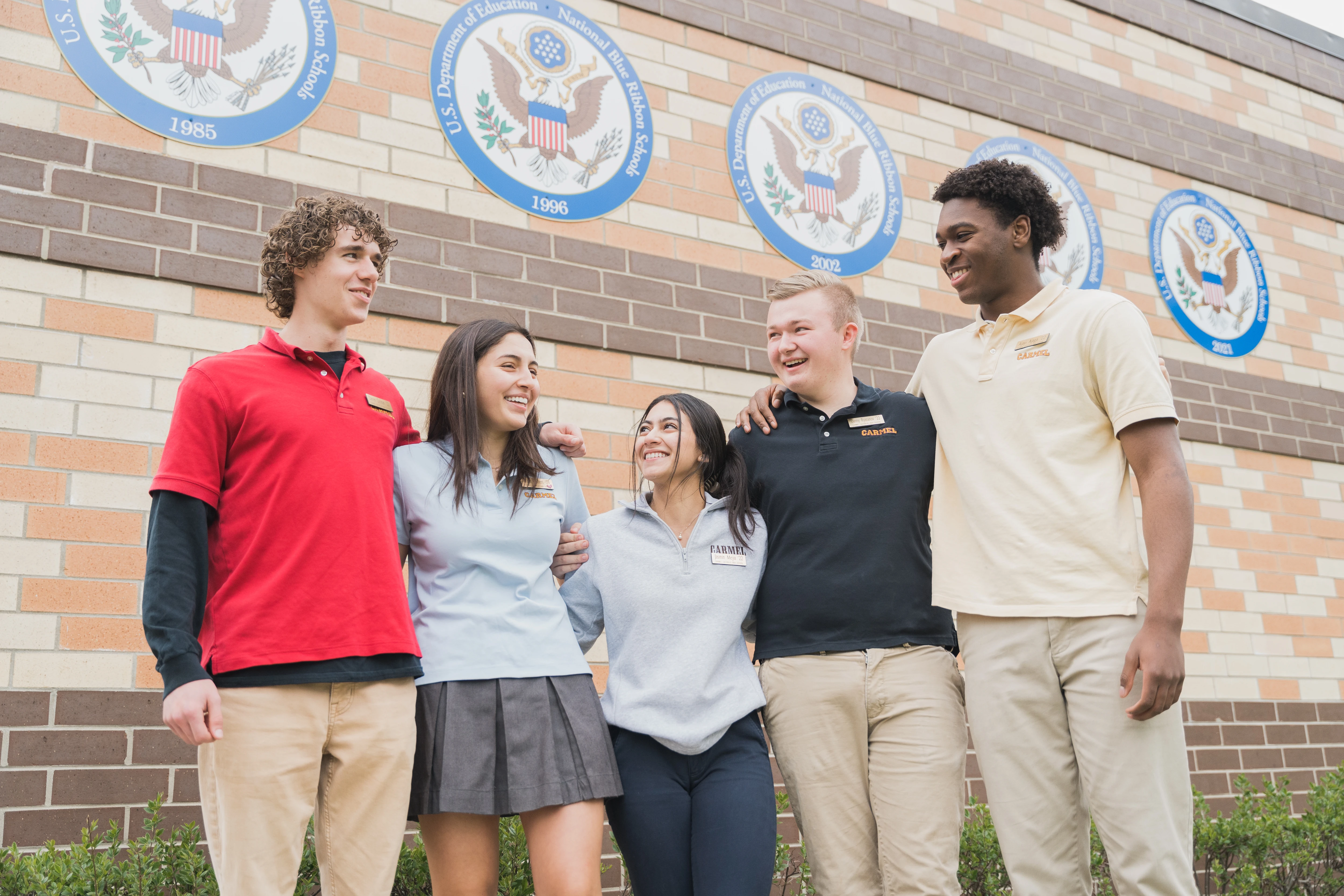 Carmel Catholic High School students standing together outside
