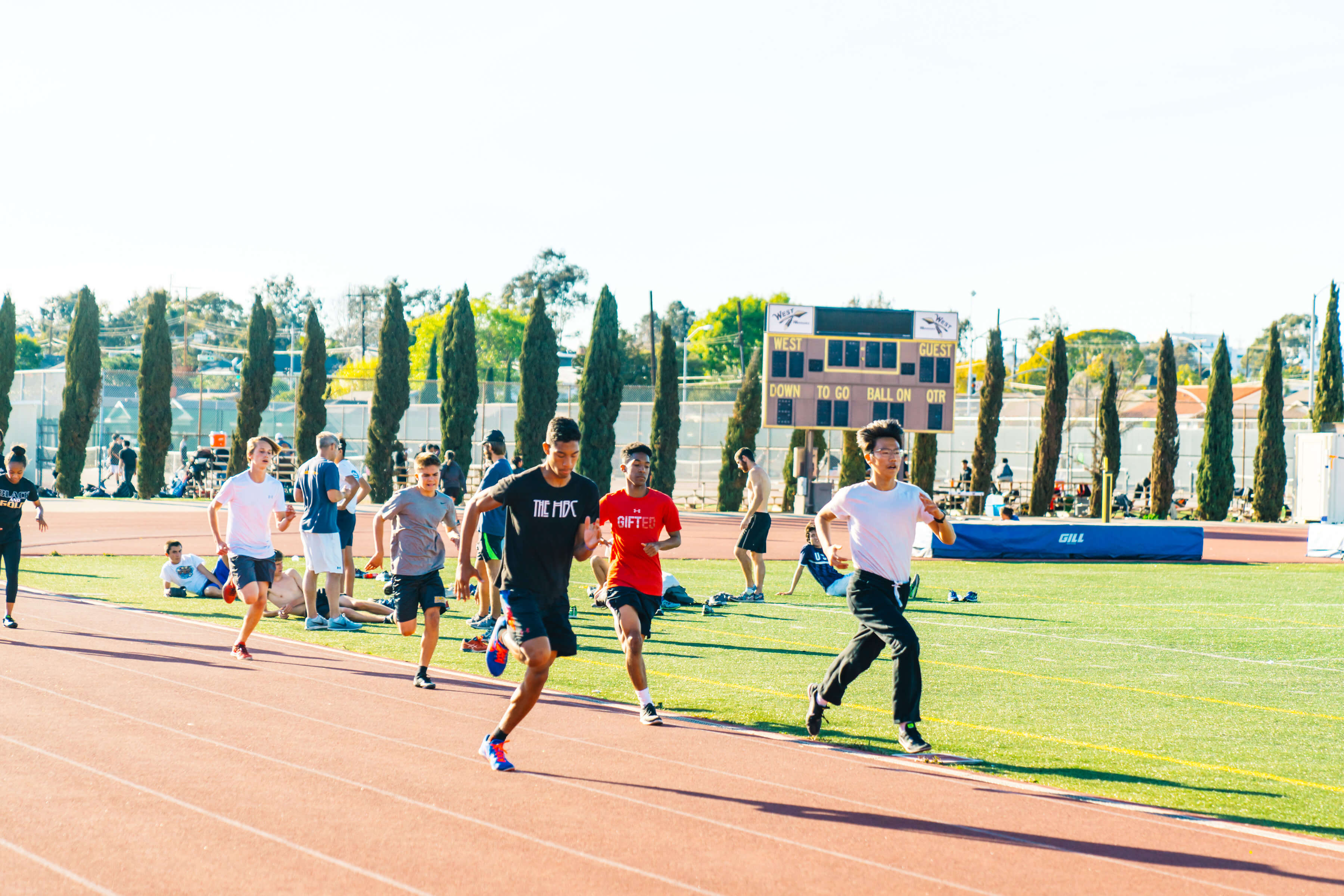 Bishop Montgomery students running on the athletics track