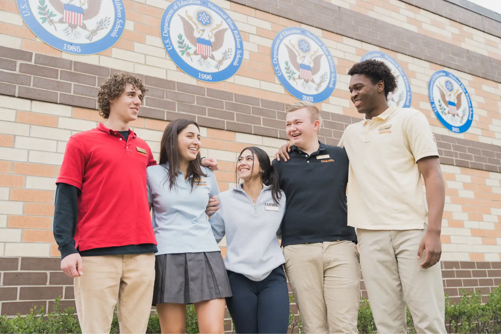 Carmel Catholic High School students standing together outside