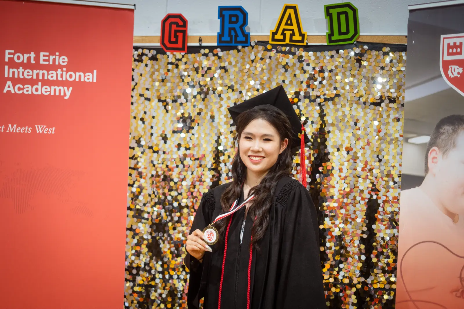 Fort Erie International Academy graduate in cap and gown