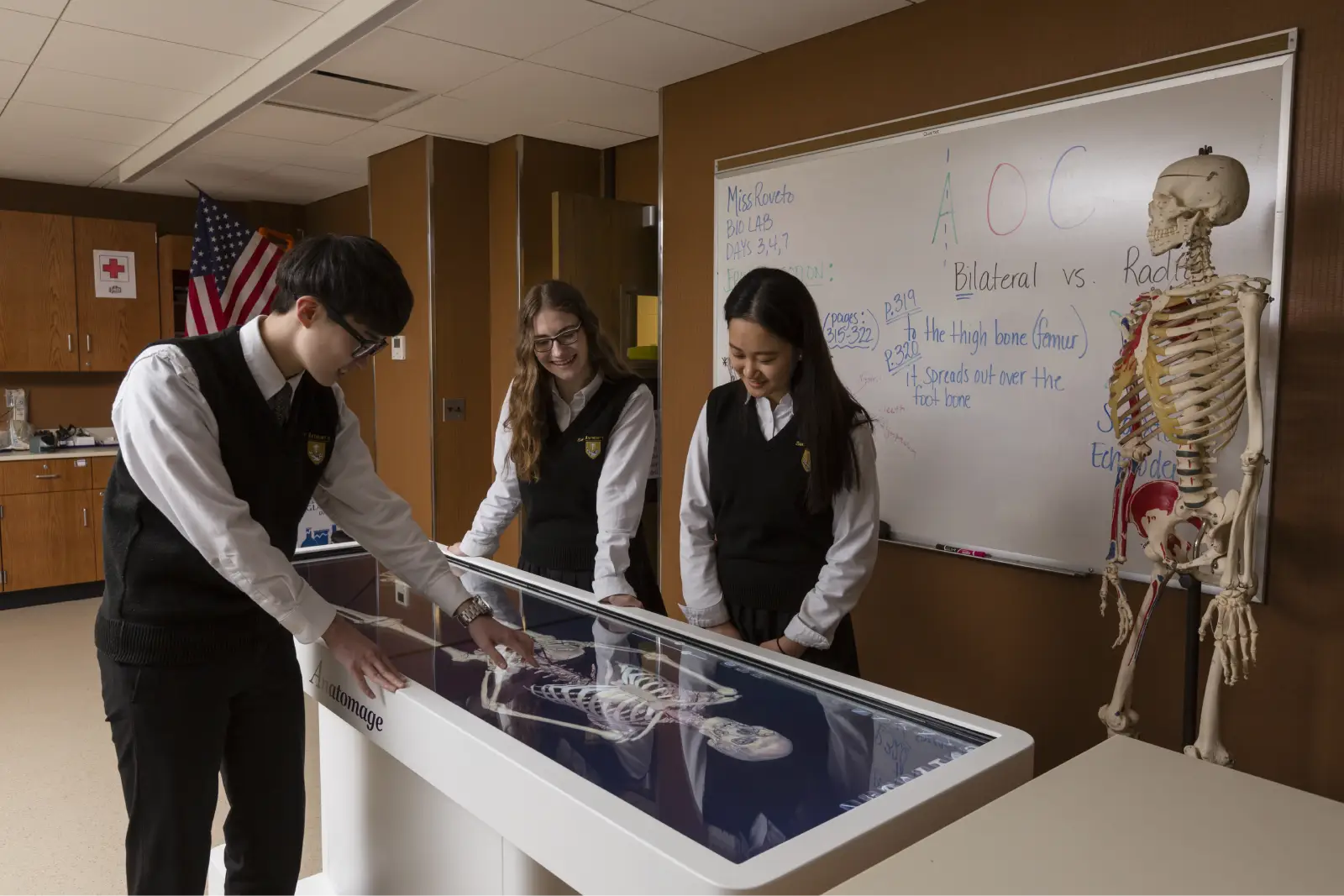 Saint Anthony's High School students using a digital anatomy table