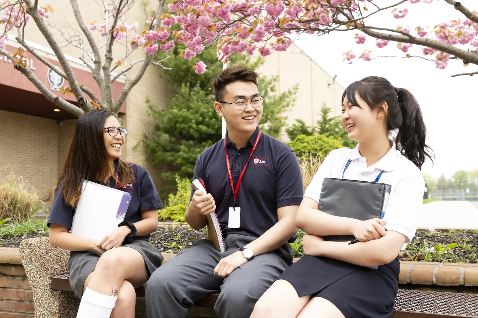 Saint John's High School students talking outside
