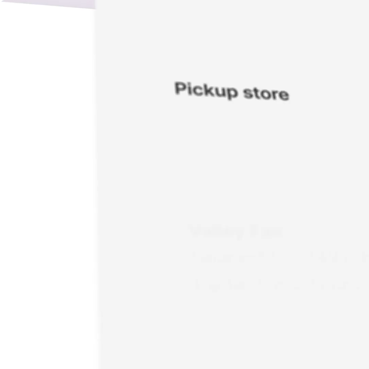 Texto borroso con las palabras 'Pickup store' en negro sobre fondo claro.