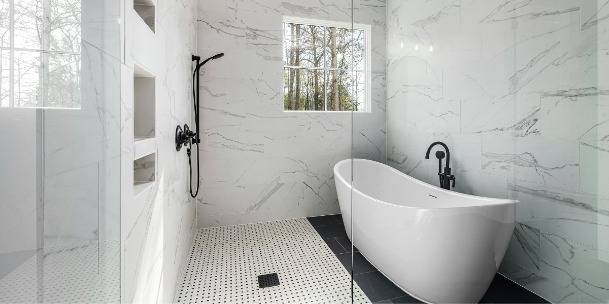 bath with tile floors