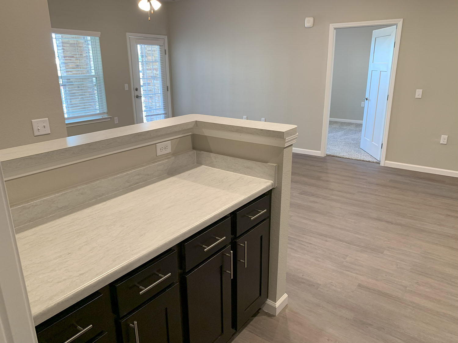 Kitchen with dark cabinets