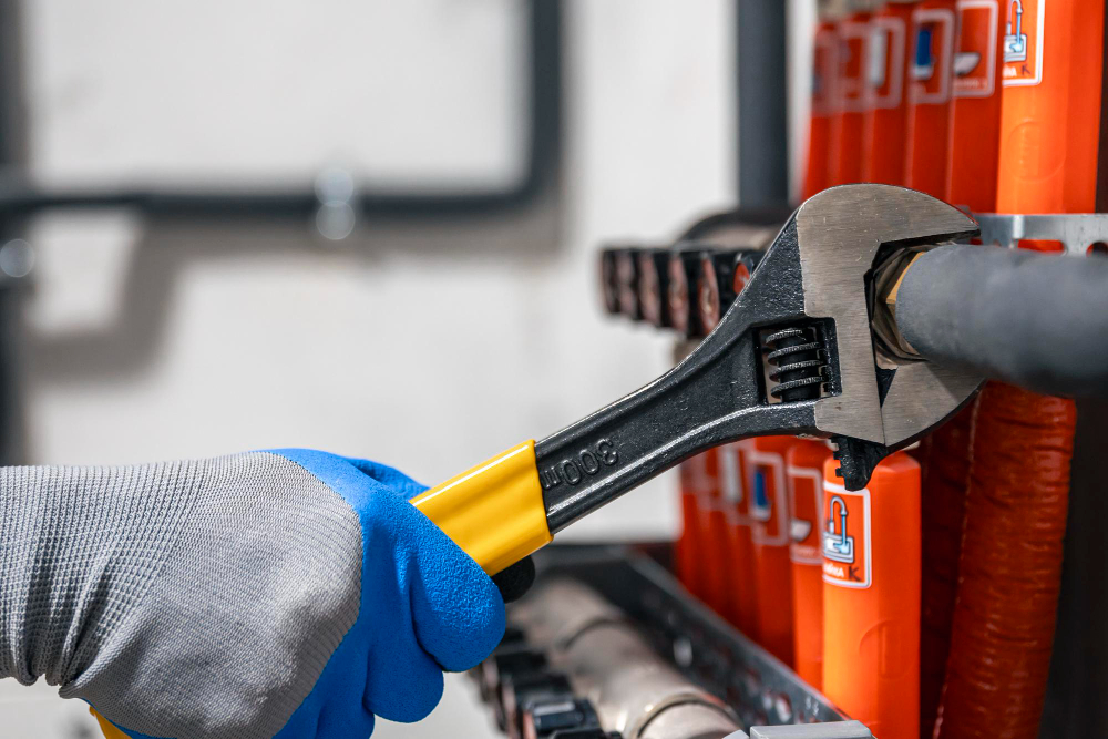 Licensed plumber servicing home in Wells County