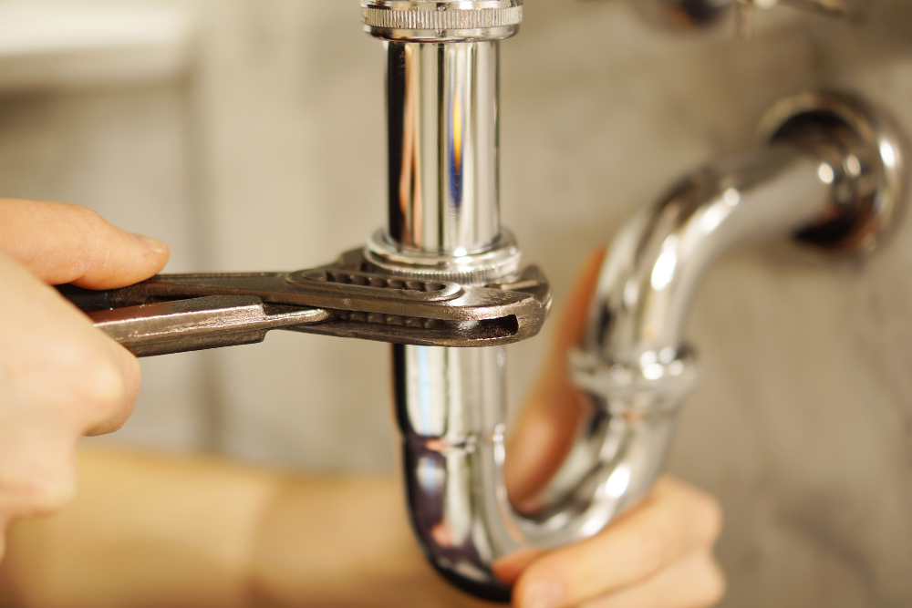 Trusted plumber fixing clogged kitchen sink in Steuben County, IN