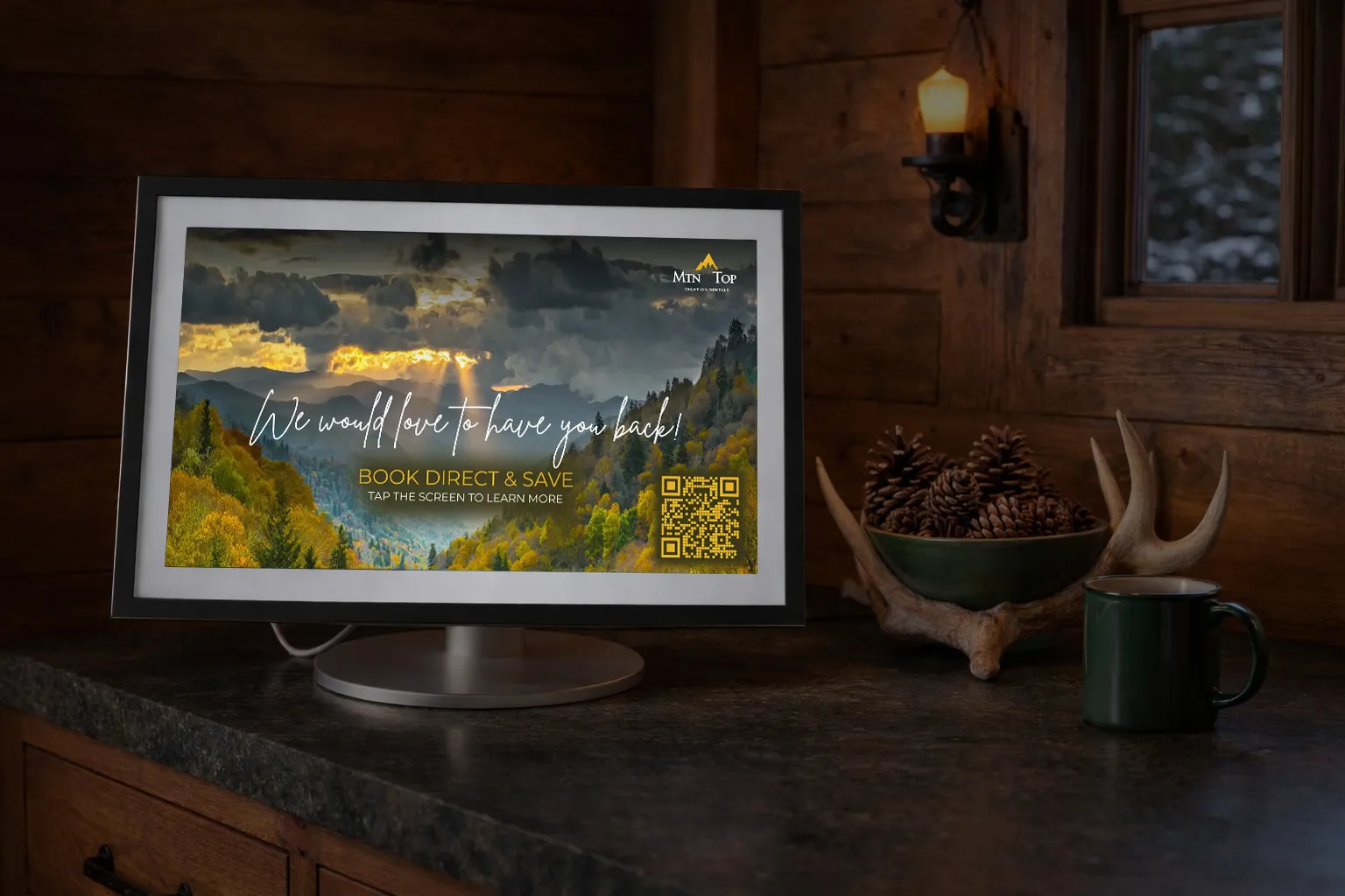 An Amazon Echo flatscreen device on the wall offering vacation rental guests the ability to rebook direct and save money vs using Vrbo or Airbnb.