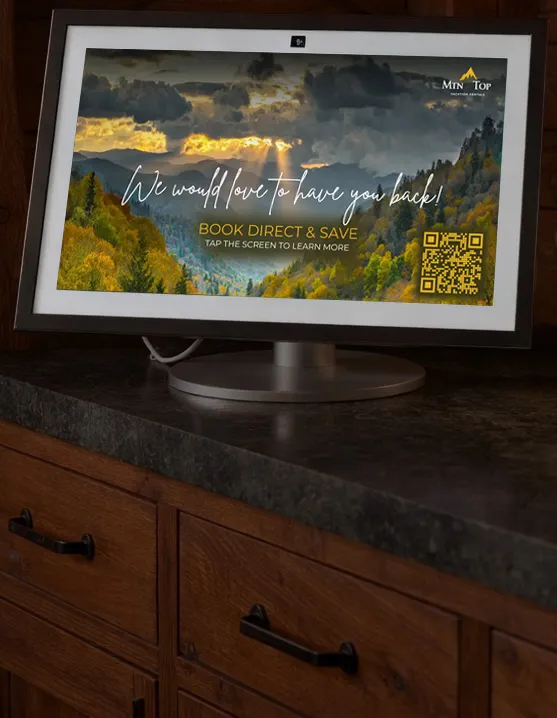 An Amazon Echo flatscreen device on the wall offering vacation rental guests the ability to rebook direct and save money vs using Vrbo or Airbnb.