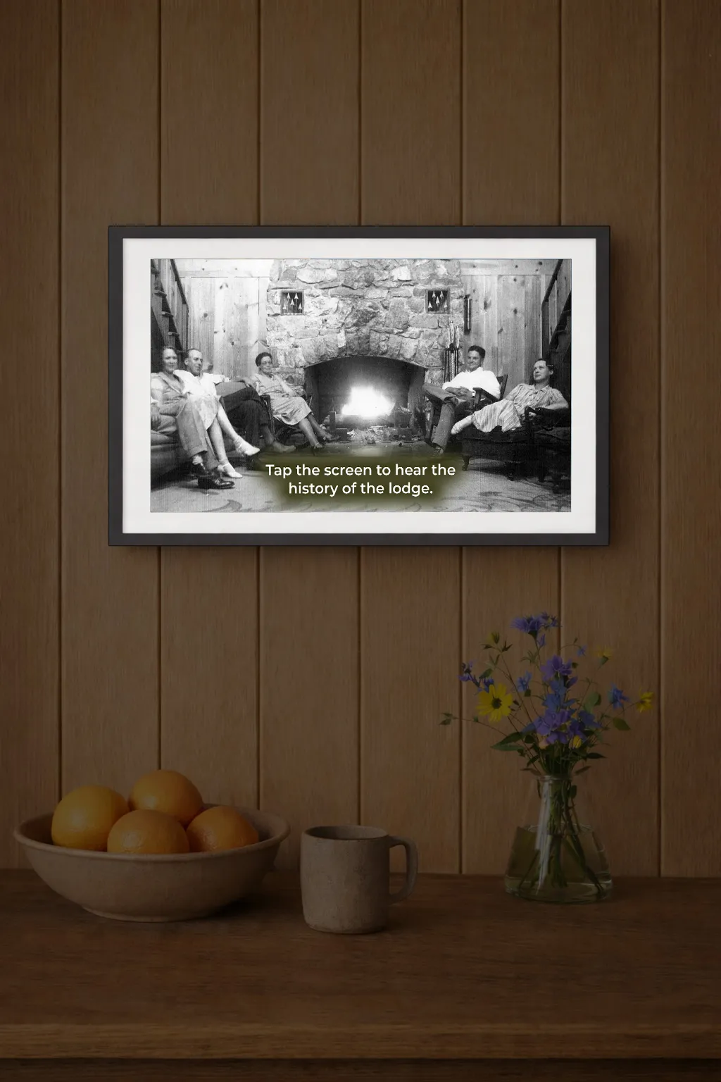 An Alexa device on the wall offering vacation rental guests information on the history of the place they are staying.