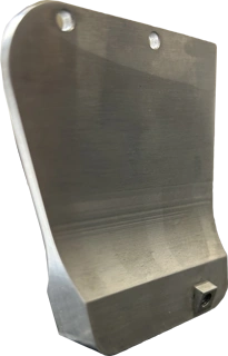 A metal component sample from KT Machining. The piece is a flat surface which slowly tapers out into a bulge at the bottom, with an extruded hole.