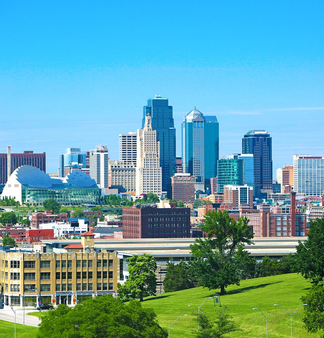 Lee's Summit city buildings and park in foreground.