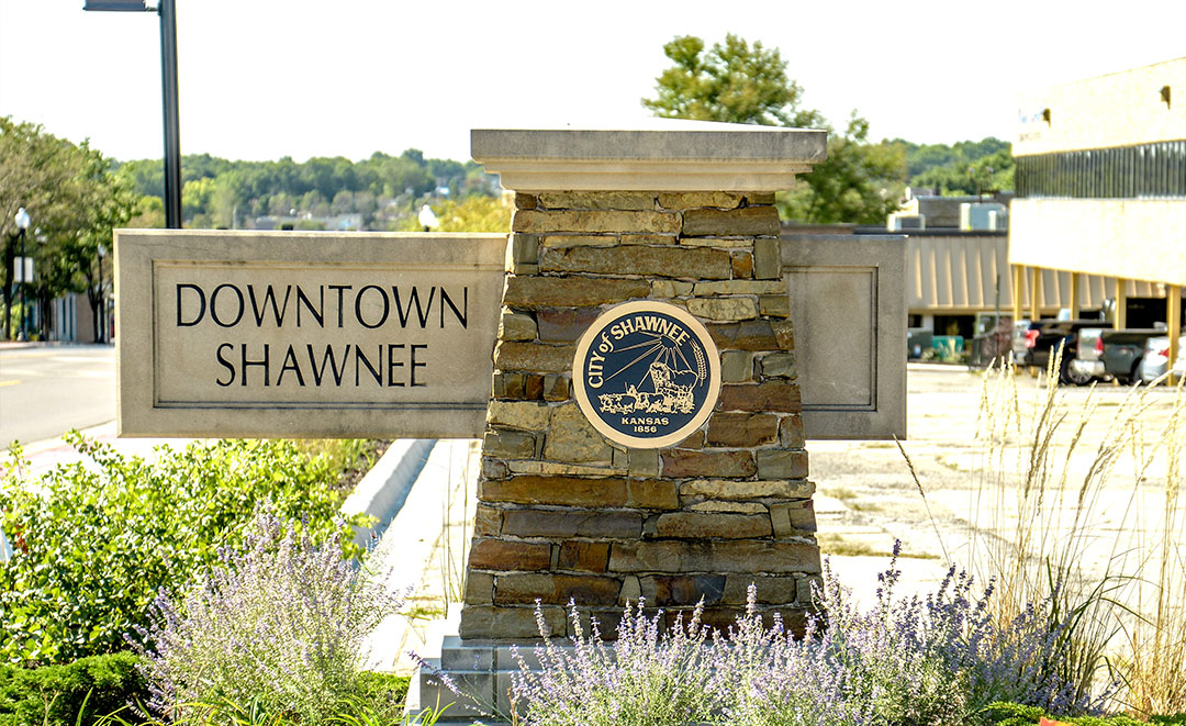 Stone marker displaying "Downtown Shawnee"
