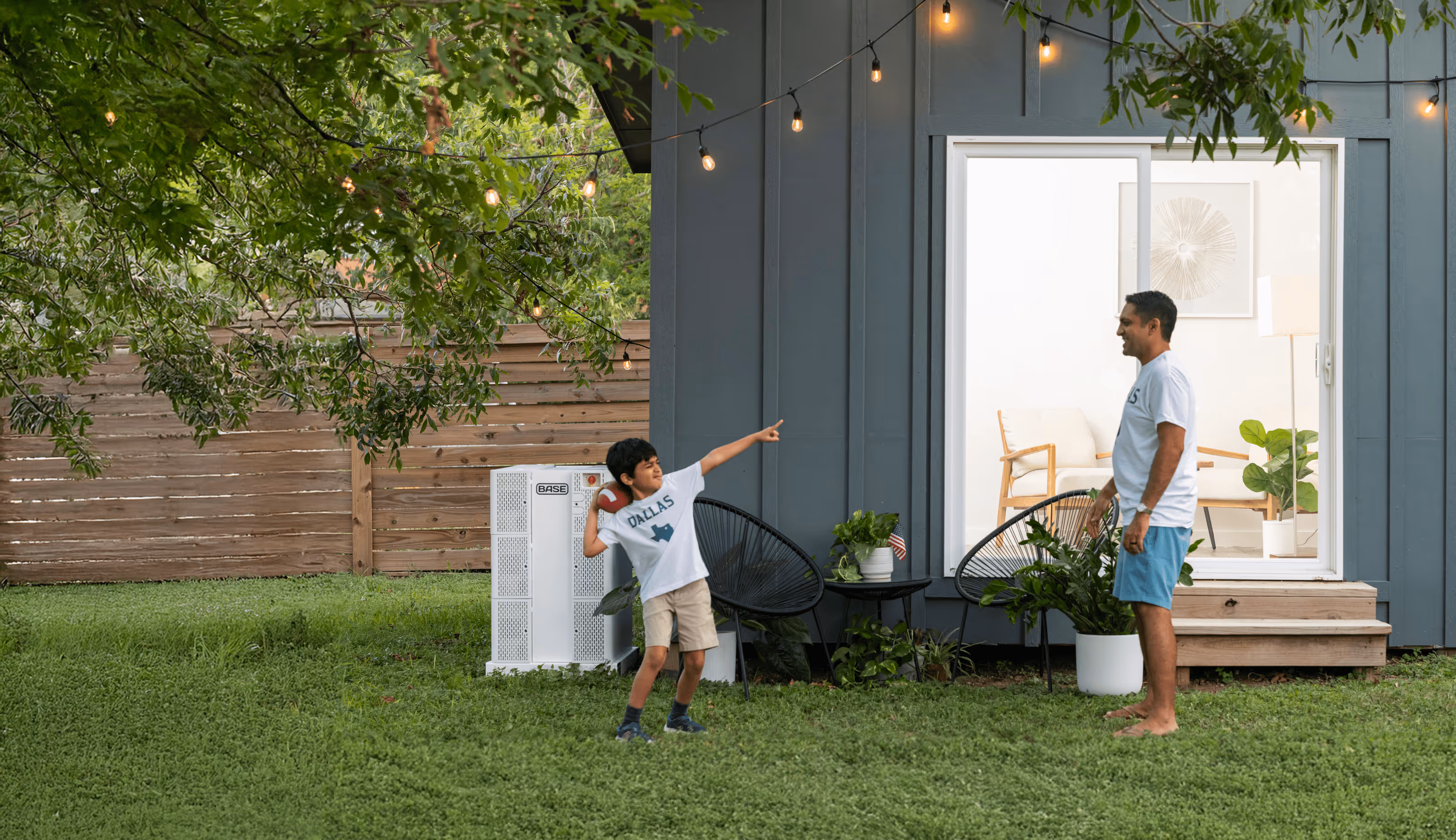 Child and Dad playing catch in a backyard