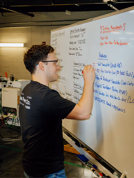 Man writing on a white board