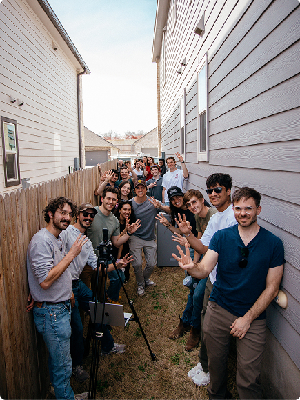 Base team next to a home