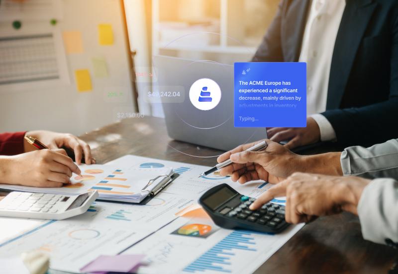 Finance team reviewing printed financial reports with charts and spreadsheets on a desk, using a calculator and laptop, while a digital interface highlights an automated insight about a performance decline at ACME Europe.