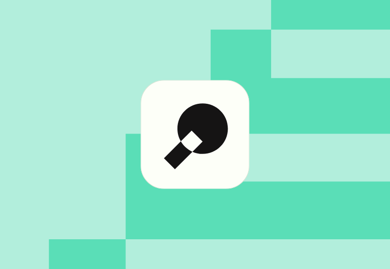 nominal symbol in black and white on a green background