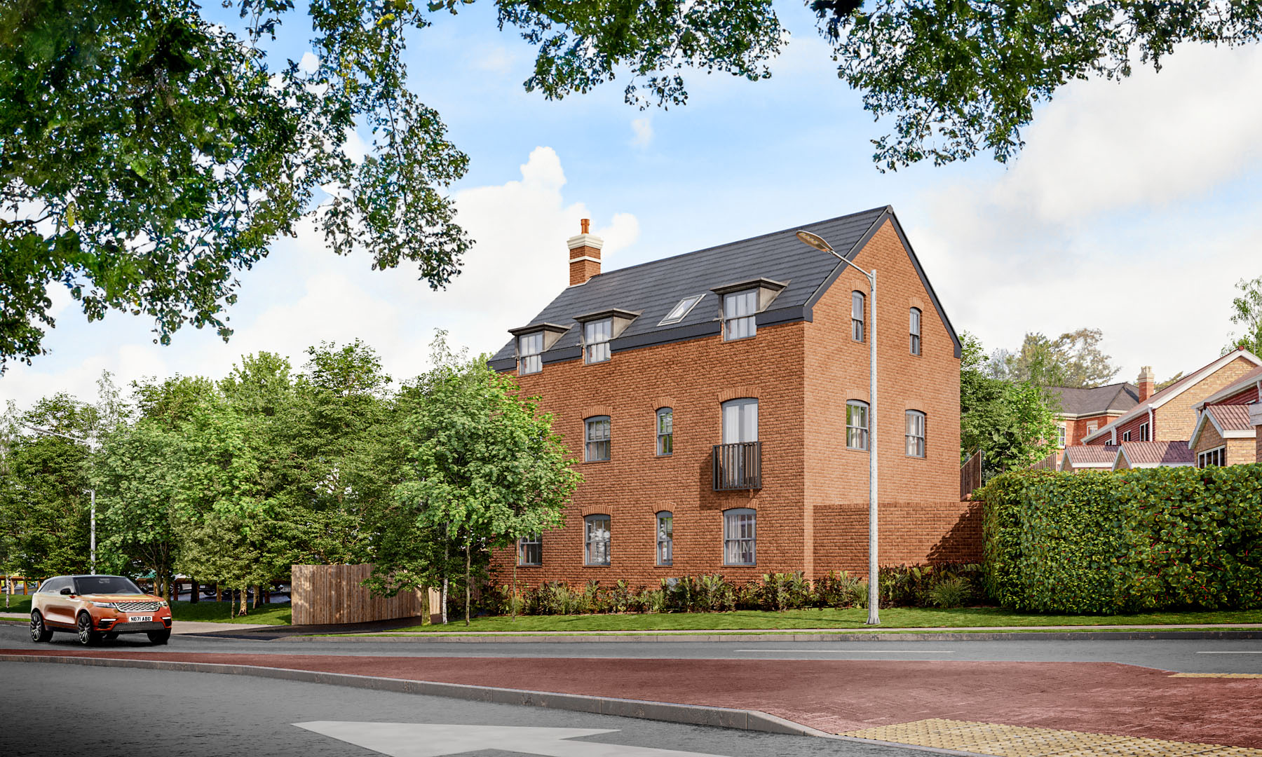Photorealistic CGI of a three-storey brick residential building with a dark roof, nestled among green trees on a city street, with a red car driving by under a clear sky.