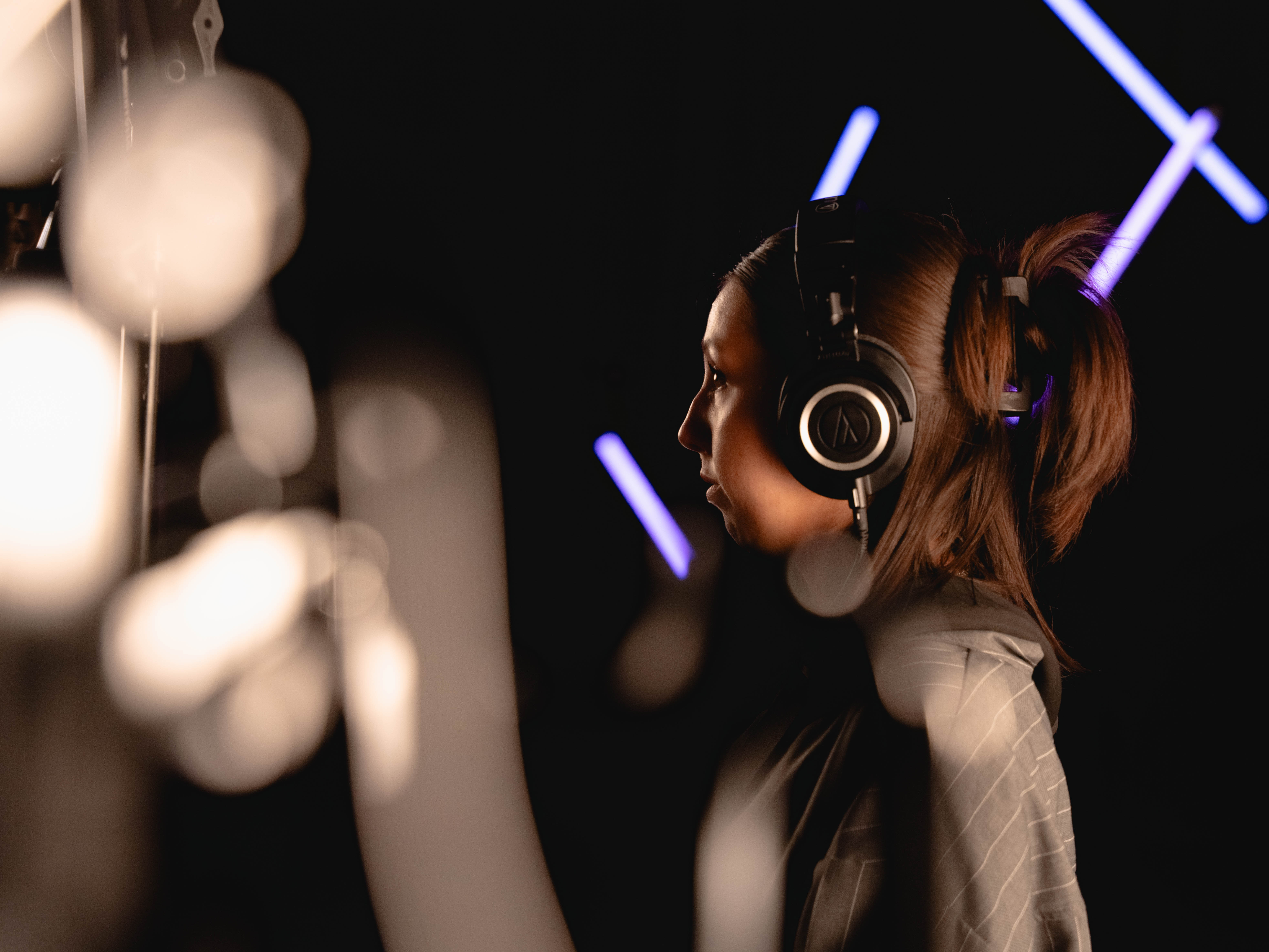 A sound recordist working on set