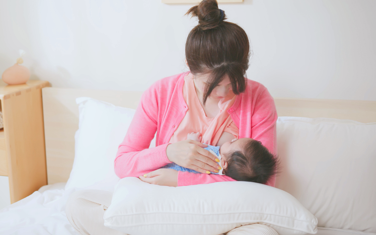 mother breastfeeding baby