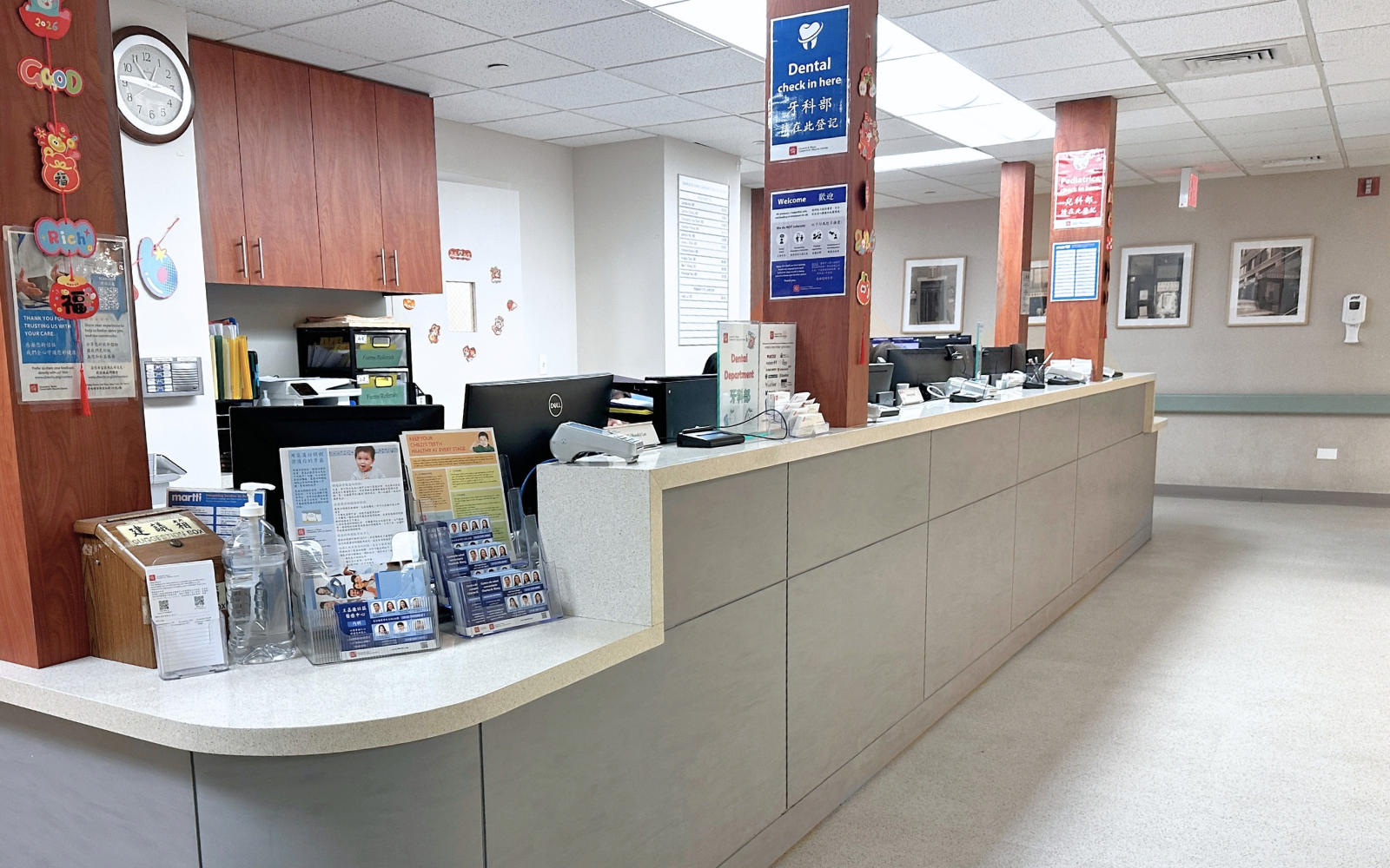 a white and green registration counter at the Health Center