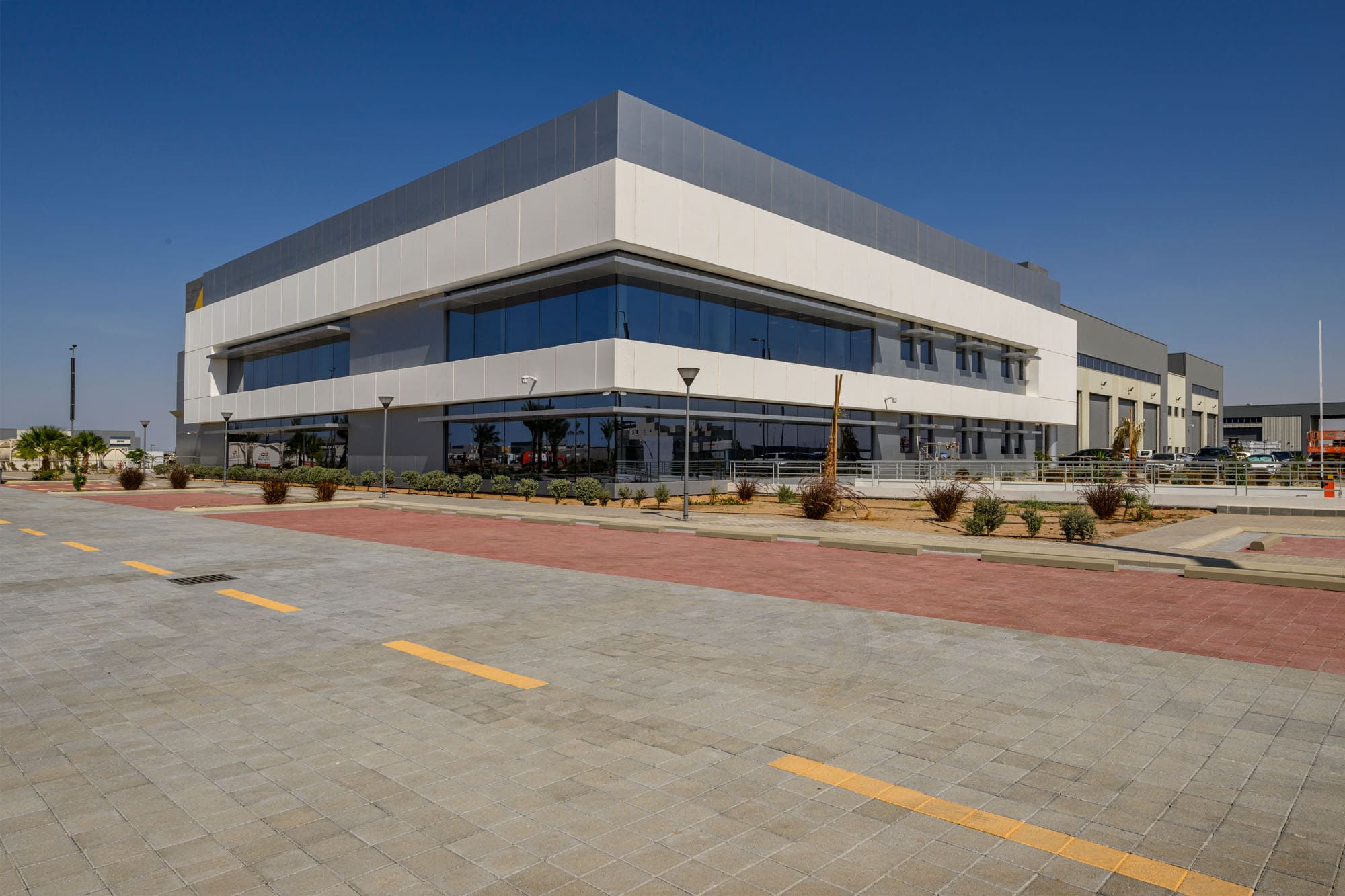 Construction of Zahid Business Park — showrooms and administrative buildings, Saudi Arabia. Delivered by OCC Weavers.