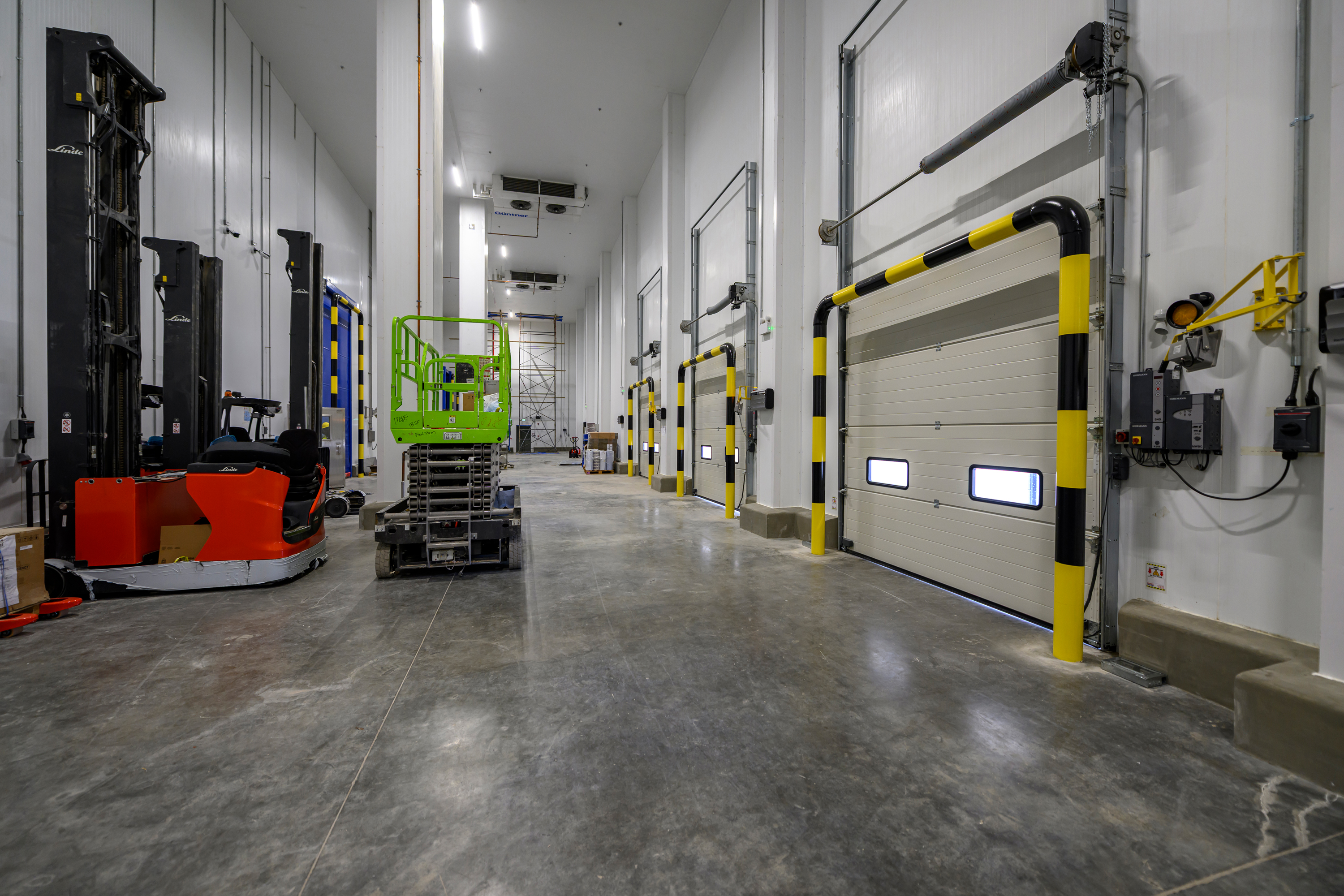 Completed factory complex and external works — Premier Food Factory II, Riyadh–Al Kharj Road, Saudi Arabia. Delivered by OCC Weavers.