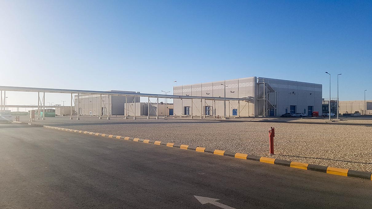 Admin building and site infrastructure — Al Marai Central Processing Plant 3, Al Kharj, Saudi Arabia. Delivered by OCC Weavers.