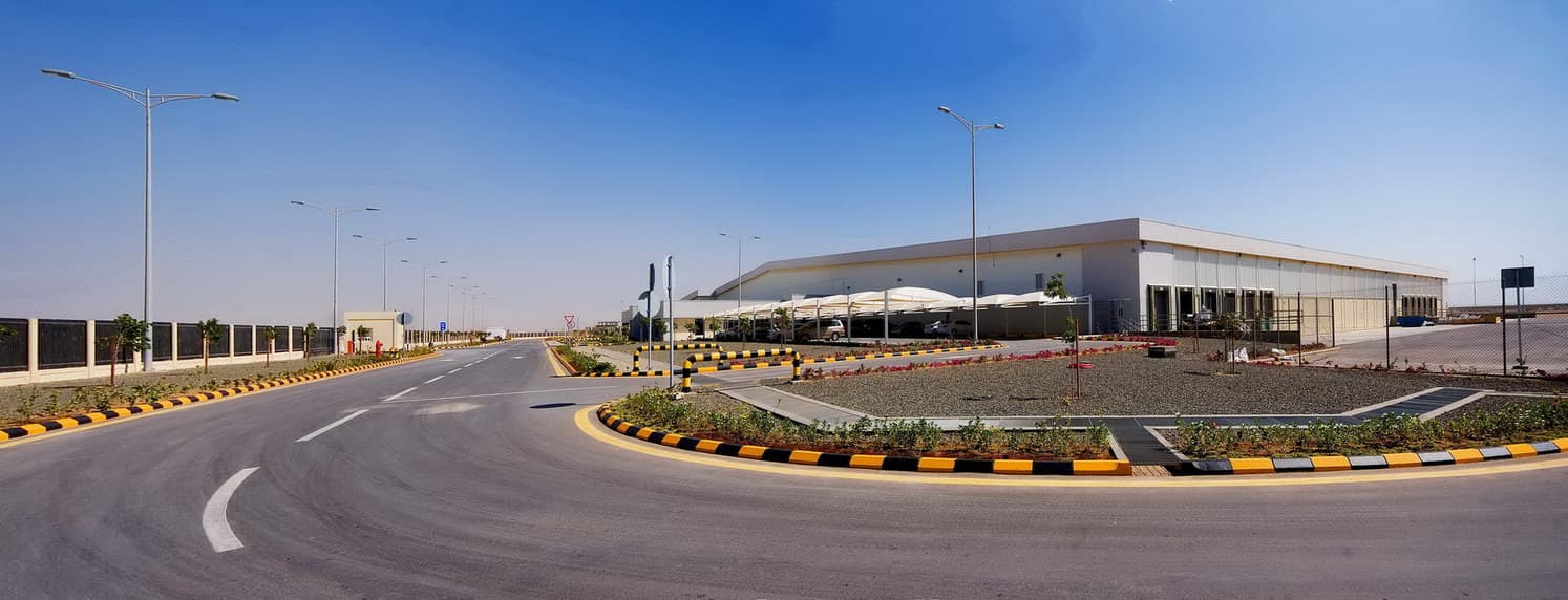 GREIF industrial container factory — main factory and service buildings, KAEC, Saudi Arabia. Delivered by OCC Weavers.