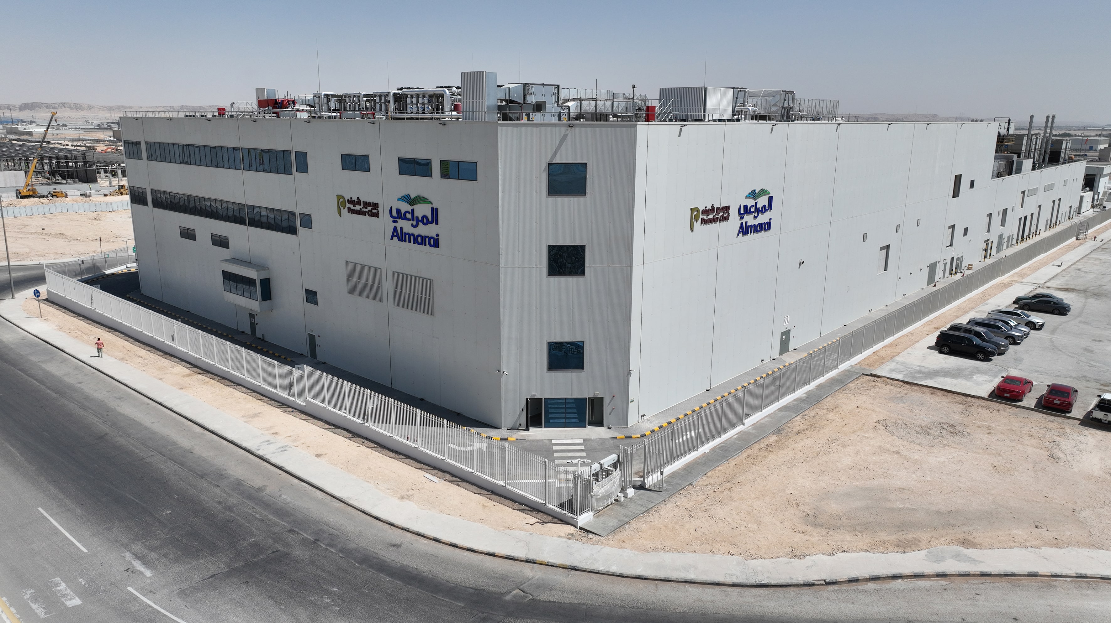 Drone view of factory and site works — Premier Food Factory II, Riyadh–Al Kharj Road, Saudi Arabia. Delivered by OCC Weavers.
