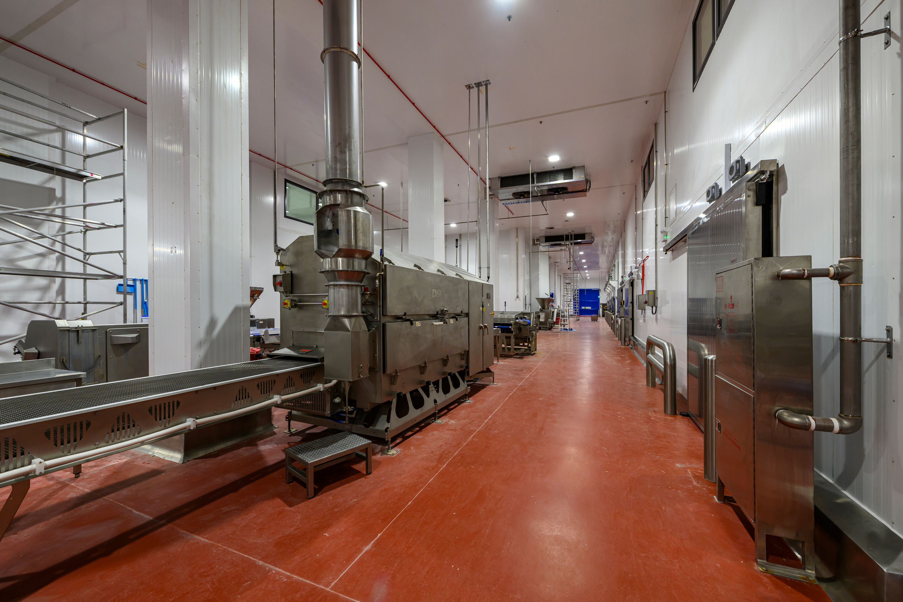 Factory building construction — Premier Food Factory II, Riyadh–Al Kharj Road, Saudi Arabia. Delivered by OCC Weavers.