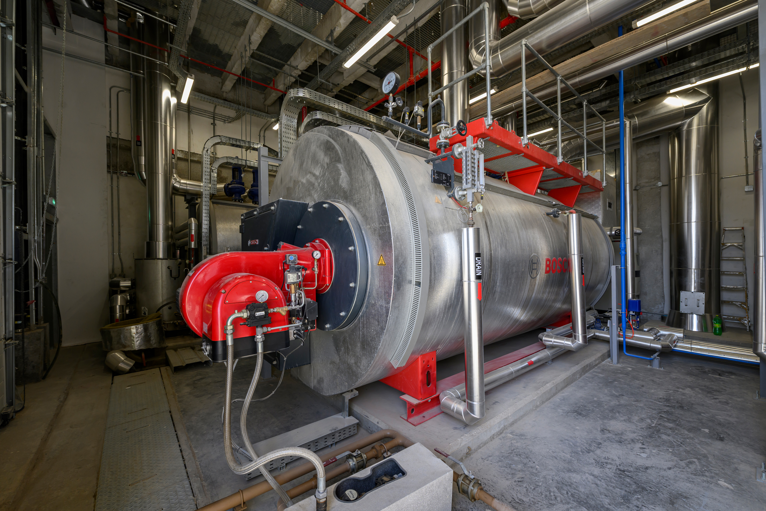 Electromechanical and utilities installation — Premier Food Factory II, Riyadh–Al Kharj Road, Saudi Arabia. Delivered by OCC Weavers.