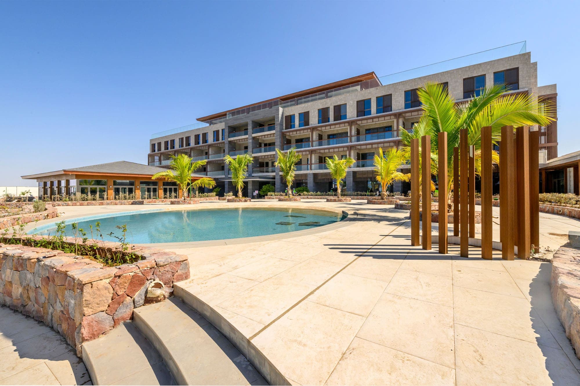 Beachside resort buildings and pools — Silver Sands Beach Resort, Obhur, Saudi Arabia. Delivered by OCC Weavers.