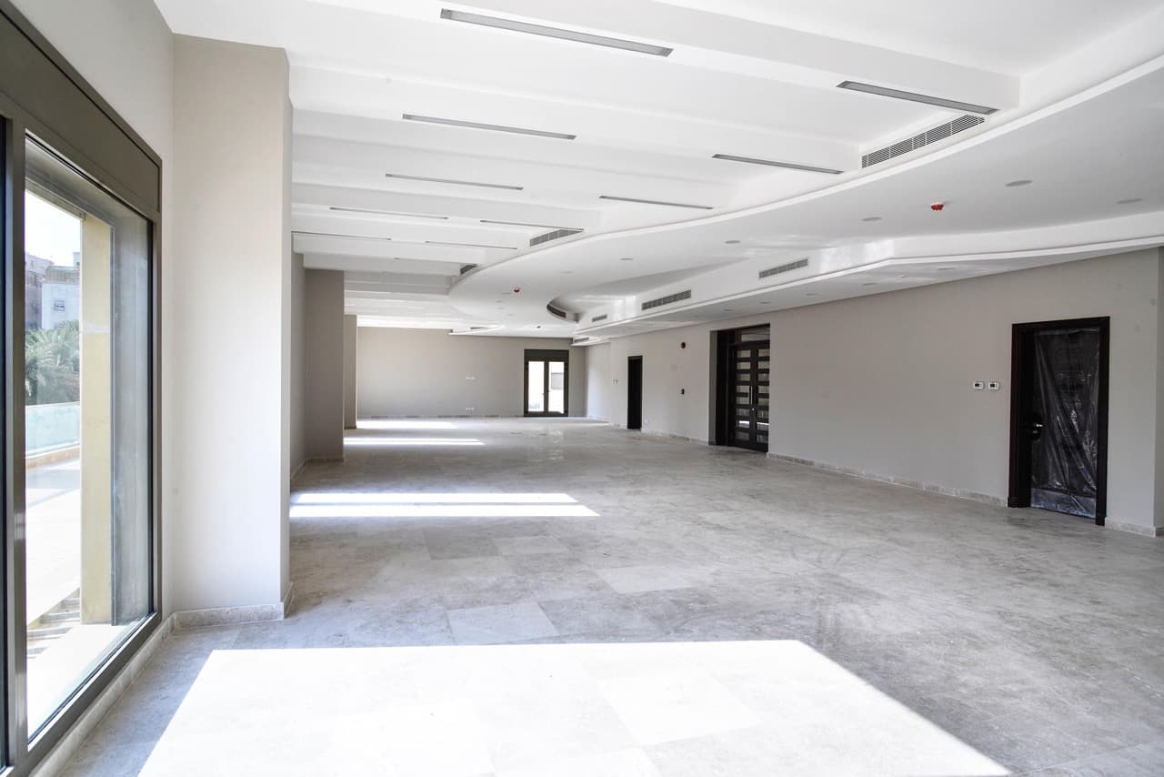 Completed apartment building facade — Al Rabwah Complex, Jeddah, Saudi Arabia. Delivered by OCC Weavers.