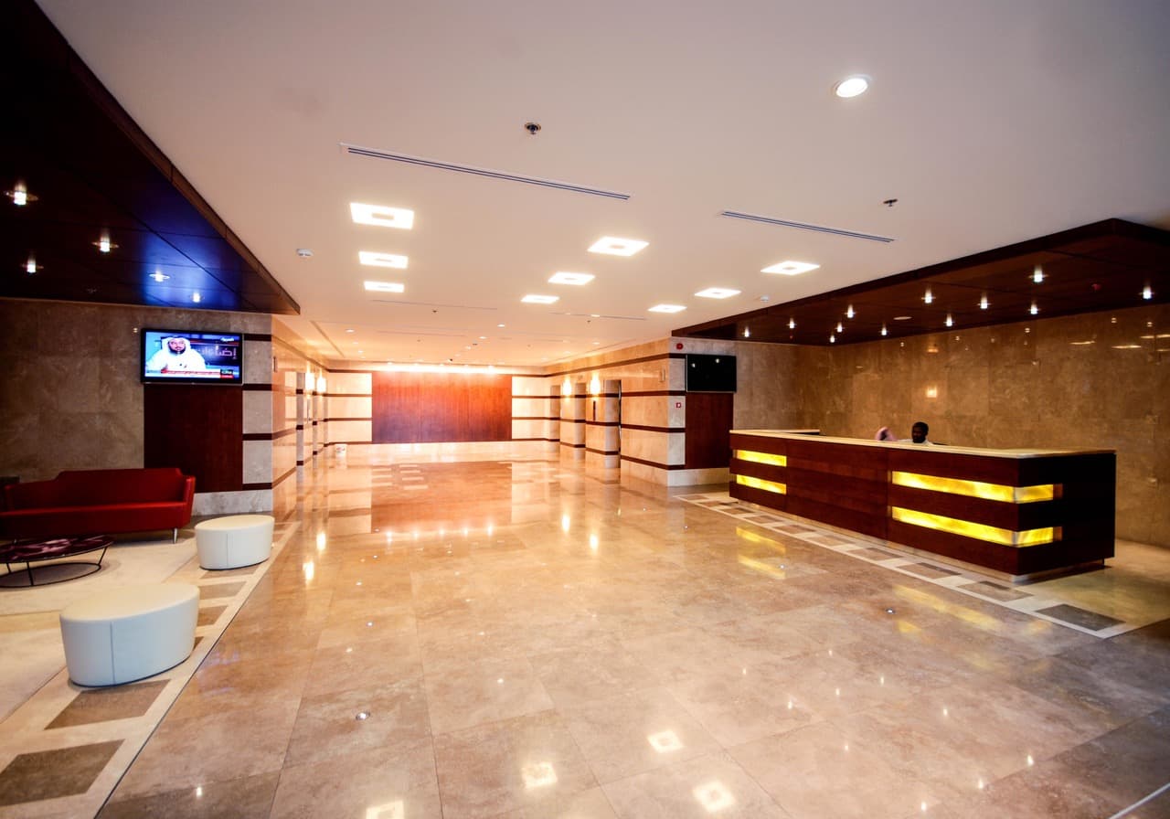 Luxury office building facade and finishing — Mukhmal II Tower, Jeddah, Saudi Arabia. Delivered by OCC Weavers.