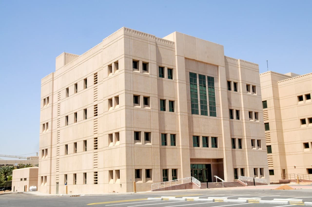 Exterior of King Abdulaziz University expansion — new two-storey classroom and laboratory buildings, Jeddah, Saudi Arabia. Delivered by OCC Weavers.