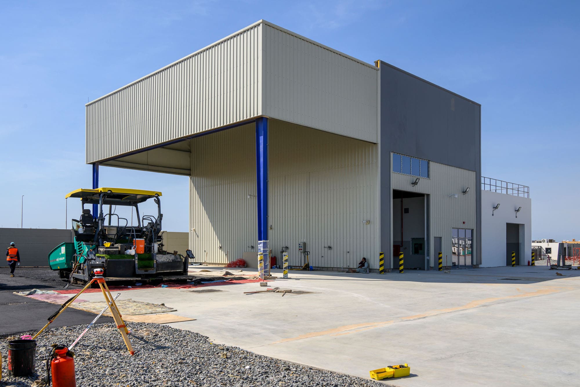 Final handover of Zahid Business Park — administrative, maintenance and showroom buildings, Saudi Arabia. Delivered by OCC Weavers.