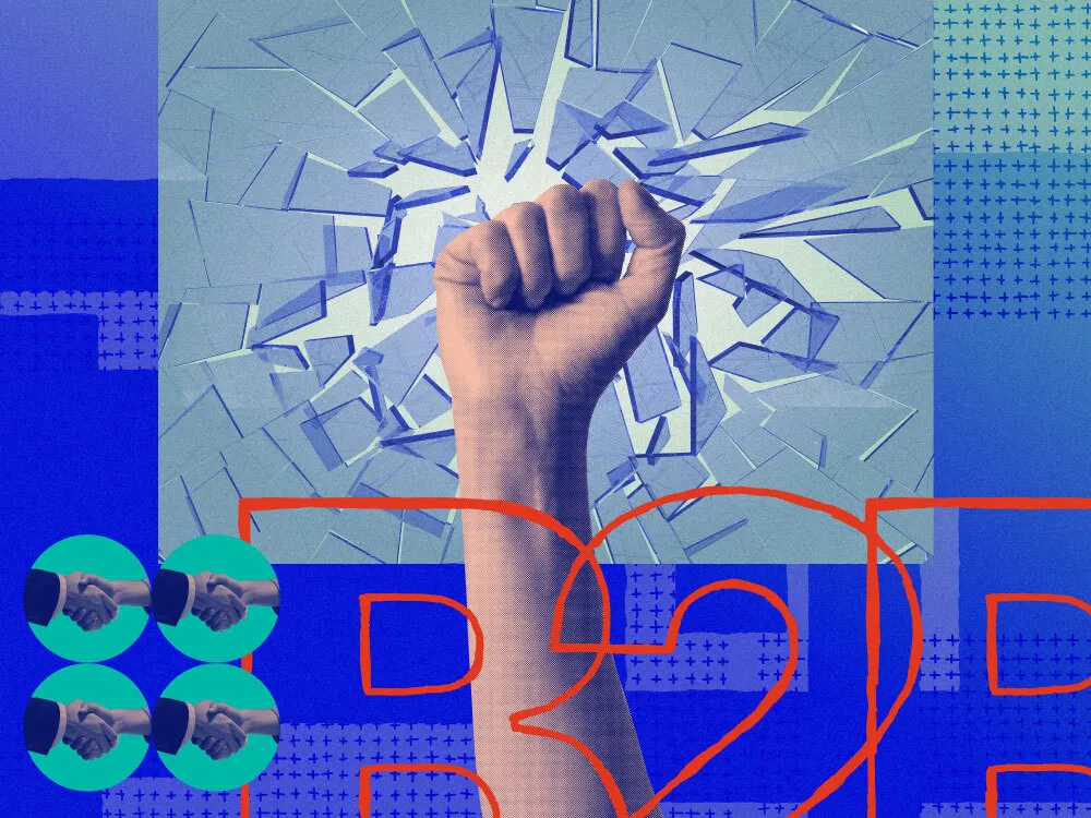 An image of a fist punching through a glass ceiling